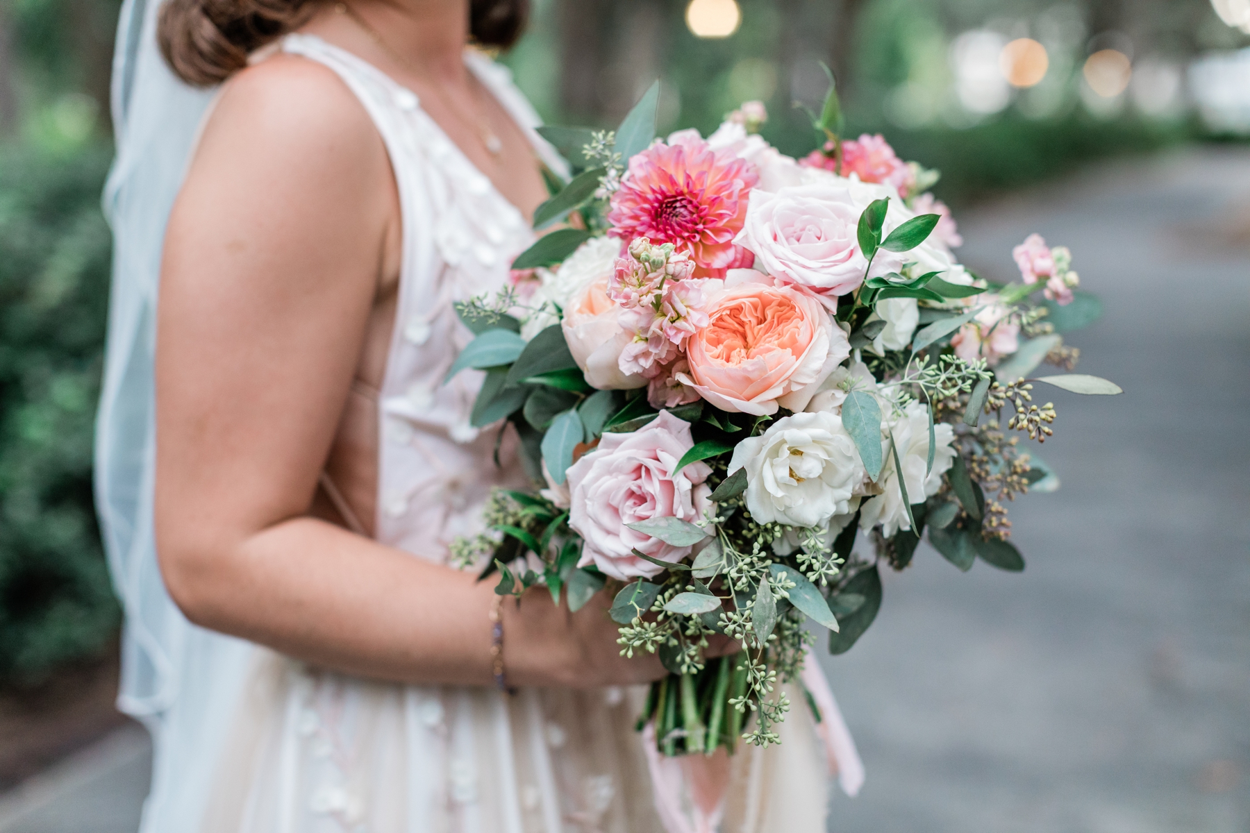 Bright corral and pink bridal bouquet by Ivory And Beau 