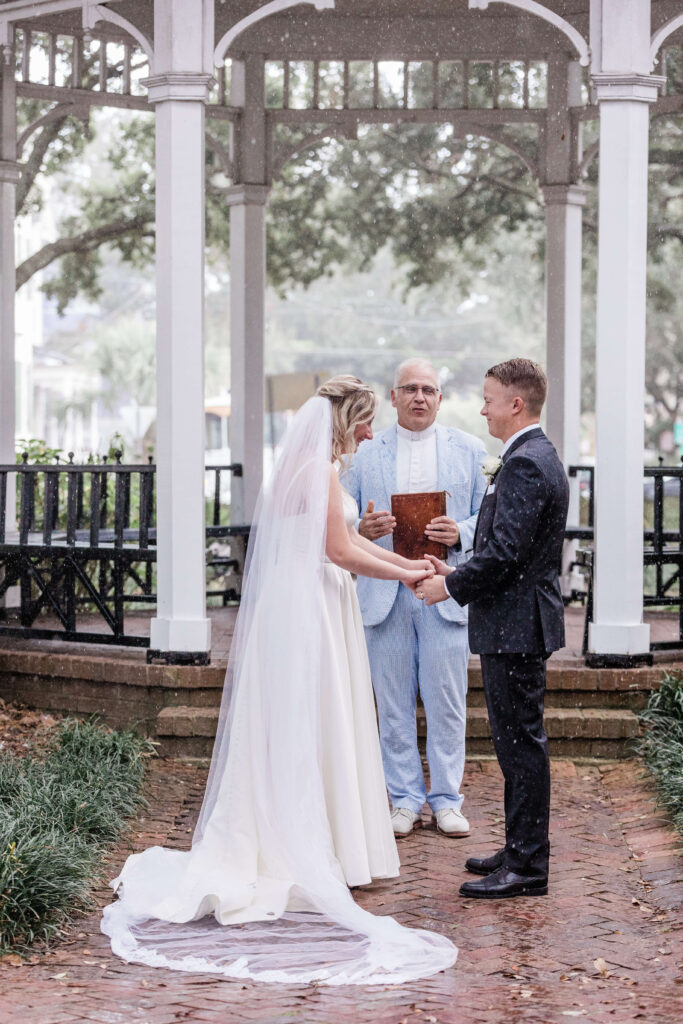 Savannah elopement ceremony as it rains at Whitefield Square