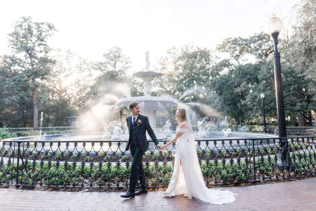 Why Savannah is the best place to elope in the south | Couple walking together on their elopement day in Forsyth Park